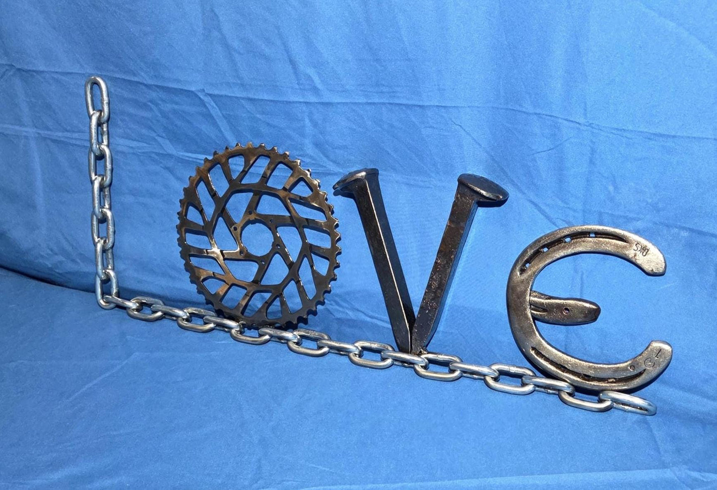 Repurposed Metal "Love" Sign v1