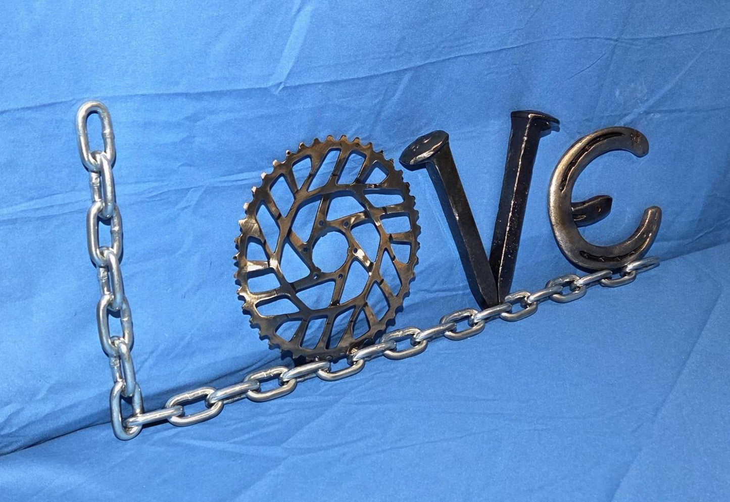 Repurposed Metal "Love" Sign v1